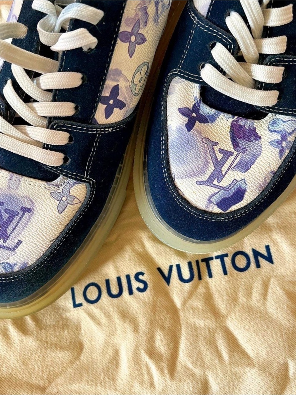 NWOT- Louis Vuitton
LV  Ollie Watercolor Monogram - Blue Leather Sneakers
Men'